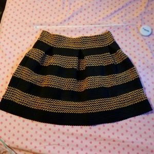 Black & gold pleated mini skirt